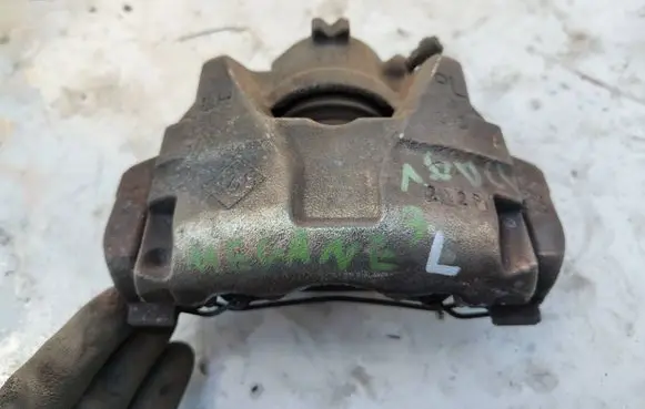 Renault Megane III Front brake caliper 