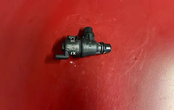 Coolant heater control valve