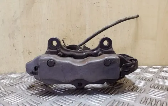 Volkswagen Touareg I Front brake caliper 207673034A