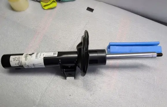 Volkswagen Caddy Rear shock absorber with coil spring 5R3413031K