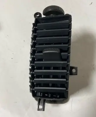 Nissan Navara D40 Dash center air vent grill 68750EB30