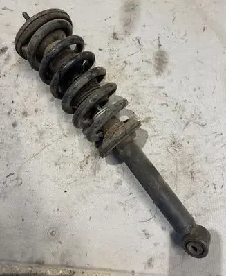 Mitsubishi Pajero Front shock absorber with coil spring