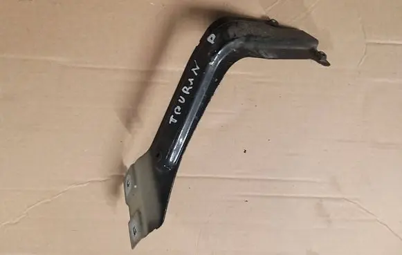 Volkswagen Touran II Fender mounting bracket 1T0821136