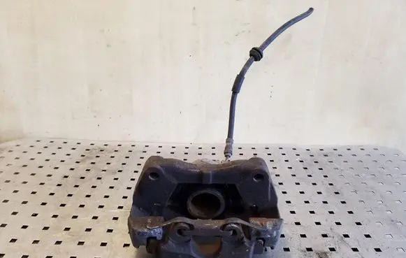 Volkswagen Touareg I Front brake caliper 7L6106D