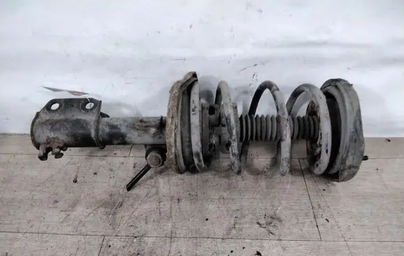 Renault Laguna I Front shock absorber with coil spring