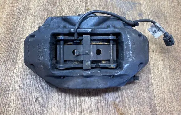 Volkswagen Touareg II Front brake caliper 7P6615105AJ