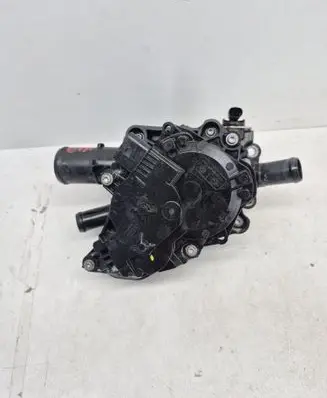 Thermostat/thermostat housing