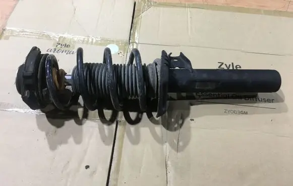 Volkswagen Golf Plus Front shock absorber with coil spring 1K0413031