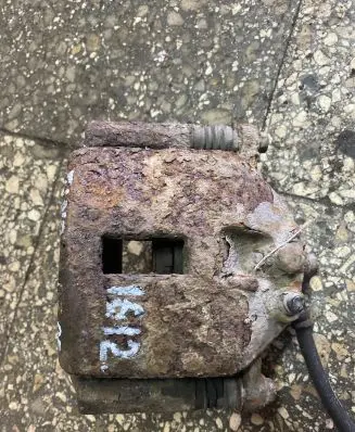 Nissan Almera Tino Front brake caliper
