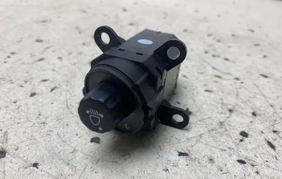 Headlight level height control switch
