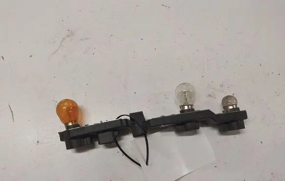Volvo S60 Tail light bulb cover holder 153852 153854