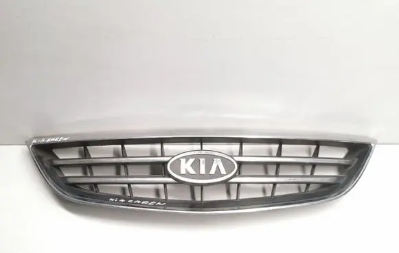 KIA Carens I Front bumper upper radiator grill OK2EF50710