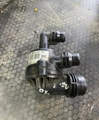 Thermostat/thermostat housing