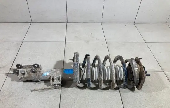 Volvo XC90 Front shock absorber with coil spring