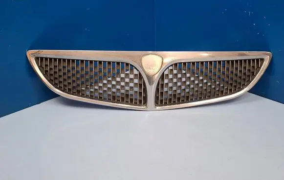 Lancia Lybra Front bumper upper radiator grill 46797131 46797130