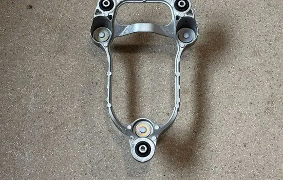 Hyundai Ioniq 5 A/C compressor mount bracket 97703GI000