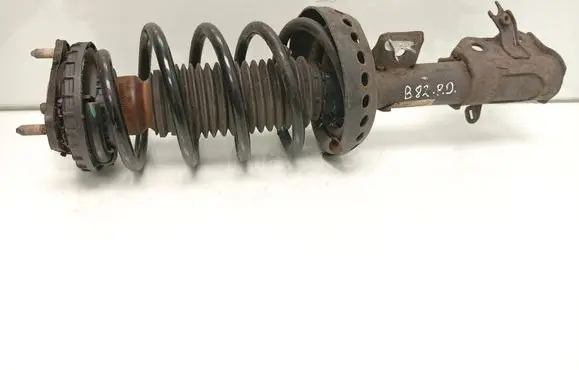 Honda Civic IX Front shock absorber with coil spring 51610TA9E521M1