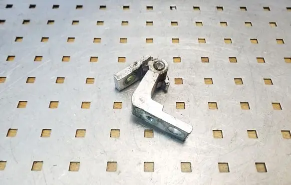 Rear door upper hinge