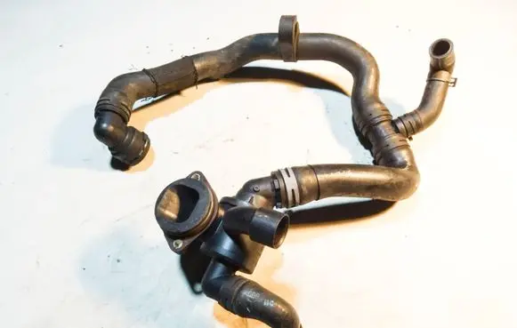 Volkswagen PASSAT B7 Engine coolant pipe/hose 03L121111AE 3AA122051A