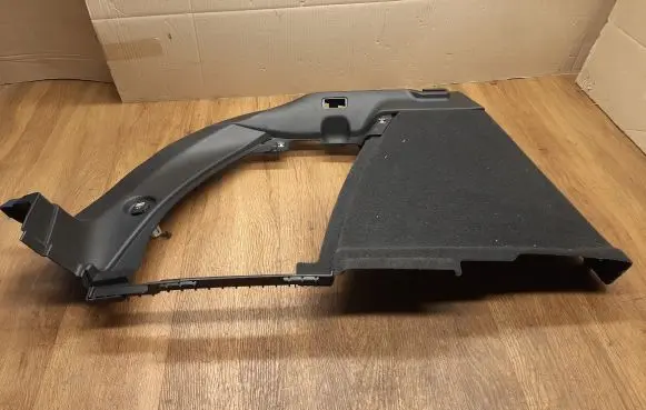 Trunk/boot side trim panel