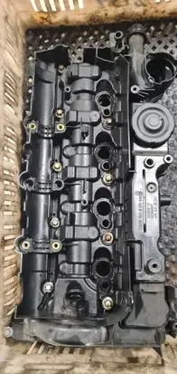 Rocker cam cover