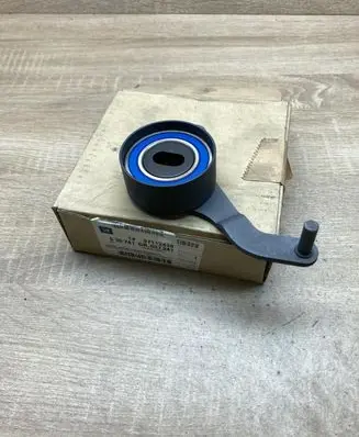 Opel Astra F Timing belt tensioner pulley 97112438 636741