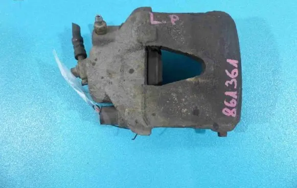 Skoda Praktik (5J8) Front brake caliper IMPRK861361