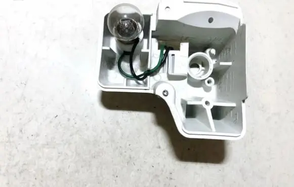 Tail light bulb cover holder
