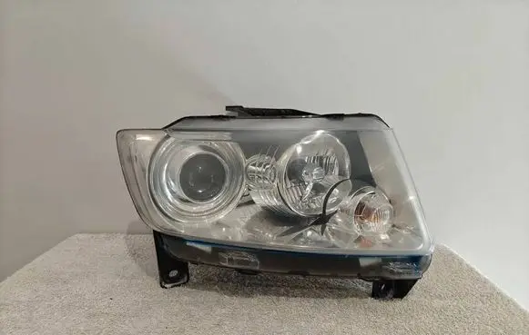 Jeep Grand Cherokee Headlight/headlamp 55079408AH M149690