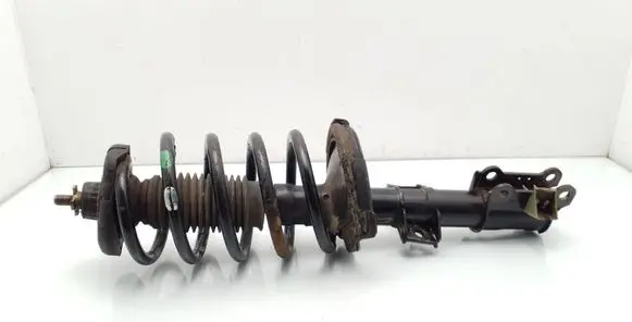 Front shock absorber with coil spring