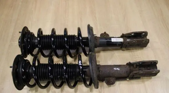 Front shock absorber with coil spring