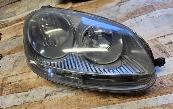 Volkswagen Golf V Headlight/headlamp A048760