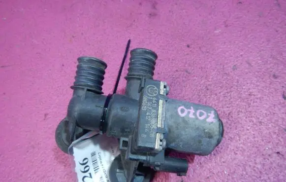 Coolant heater control valve