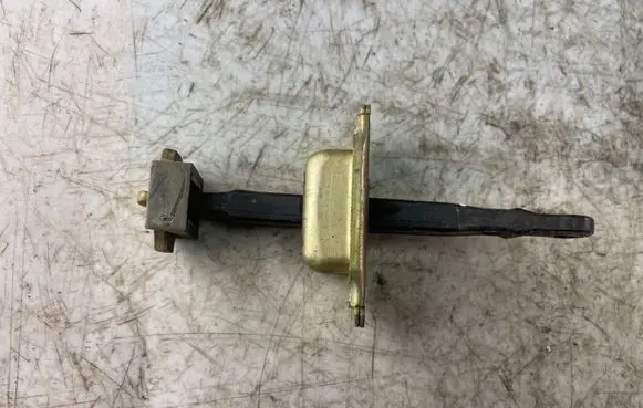 Mitsubishi Pajero Sport I Front door check strap stopper