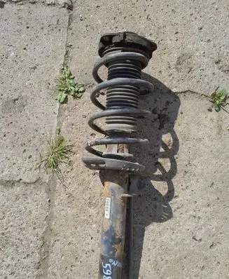 Skoda Octavia Mk2 (1Z) Front shock absorber with coil spring 1T0413031AP 19A8H1