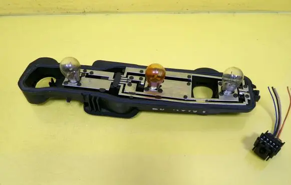 Dacia Logan I Tail light bulb cover holder 