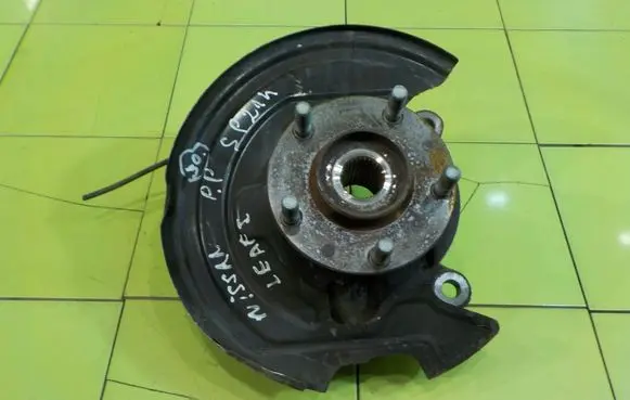 Nissan Leaf I (ZE0) Front wheel hub spindle knuckle 1KK0H SP214