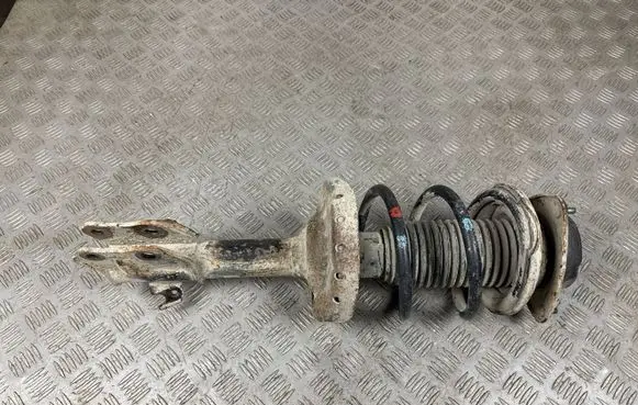 Front shock absorber with coil spring
