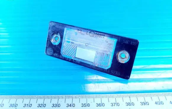 Volkswagen Touareg I Number plate light 1J5943021D 00007