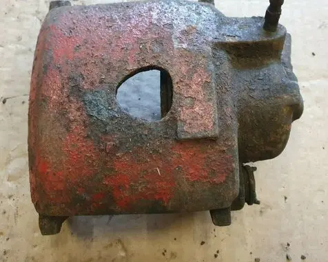 Volkswagen Golf I Front brake caliper 171615124B