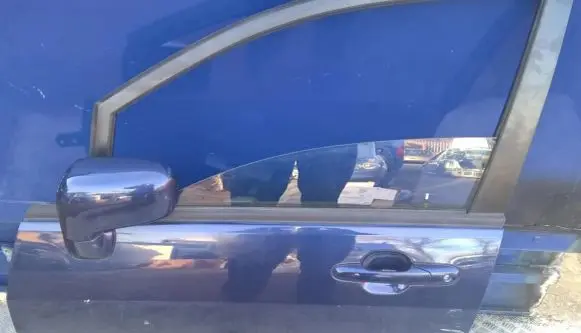 Suzuki Liana Front door