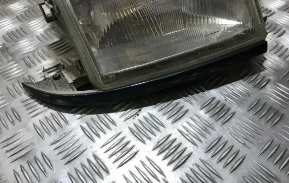 Renault Clio I Under headlight/headlamp trim 