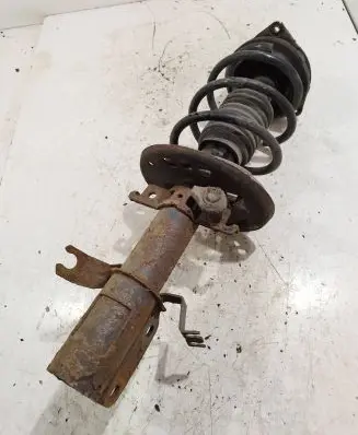 Renault Megane III Front shock absorber with coil spring