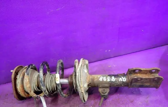 Toyota Corolla E120 E130 Front shock absorber with coil spring