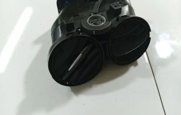 Dash center air vent grill