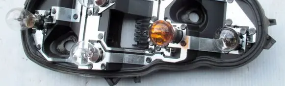 Opel Corsa D Tail light bulb cover holder