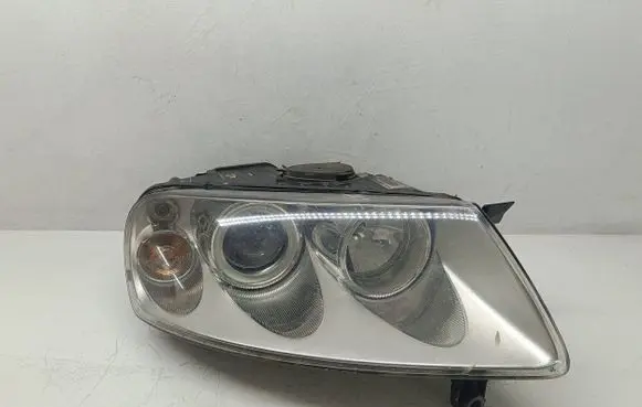 Volkswagen Touareg I Headlight/headlamp 7L6941016CE 89307881