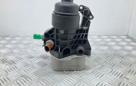 Oil filter mounting bracket