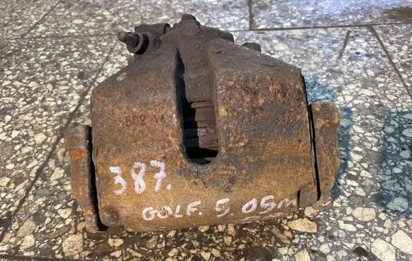 Volkswagen Golf V Front brake caliper