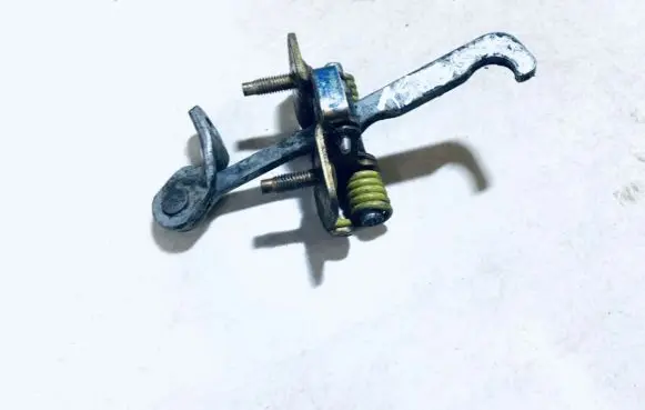 Front door check strap stopper